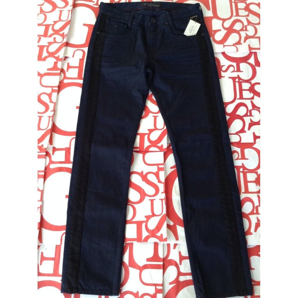 GUESS ALAMEDA SLIM TAPERED JEANS IN PARCEL WASH ZISE 28
